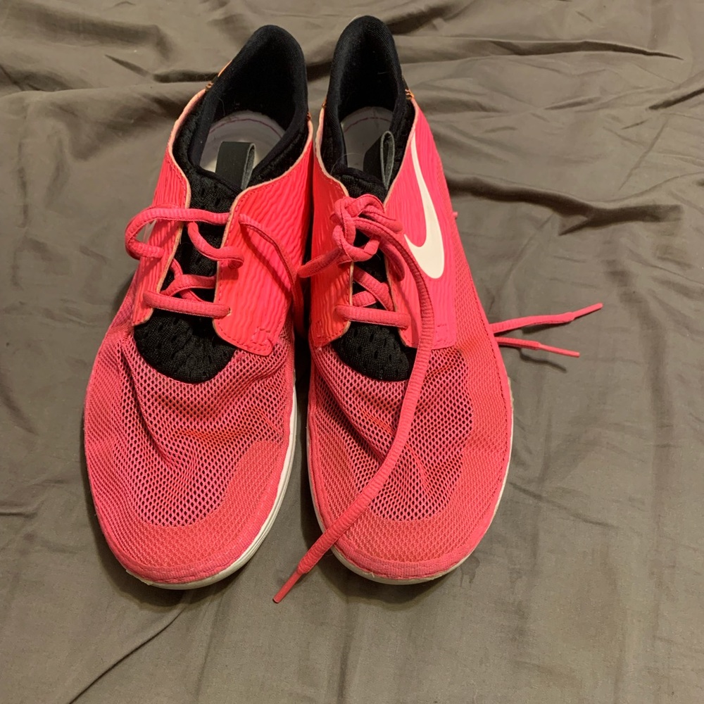 Pink and tiger Nike shoes